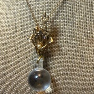 Vintage gold tone floral and crystal pool of light inspired  pendant necklace